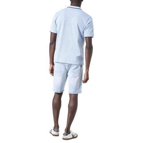 Polo en coton bleu ciel uni avec une coupe droite et un col à revers - Image 4