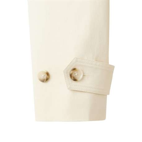 Trench coat long en coton beige uni avec une coupe ample et un col montant - Image 7