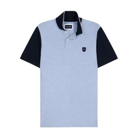 Polo en coton bleu uni avec une coupe droite et un col à revers