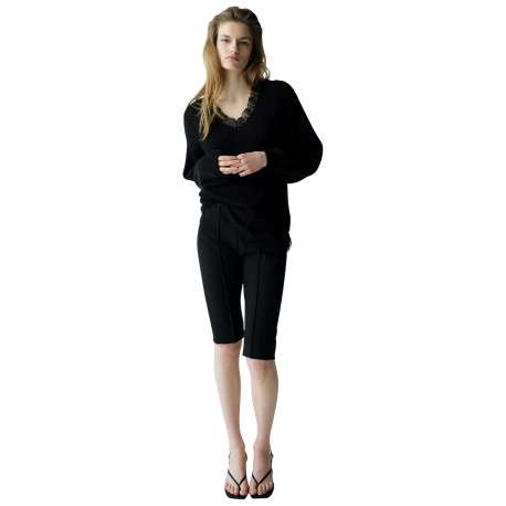 Pull noir uni avec uen coupe droite et des manches longues - Image 3