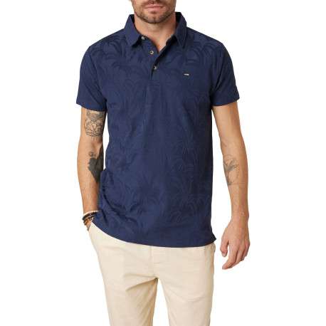 Polo en coton marine uni pourvu d'une coupe droite et d'un col boutonné