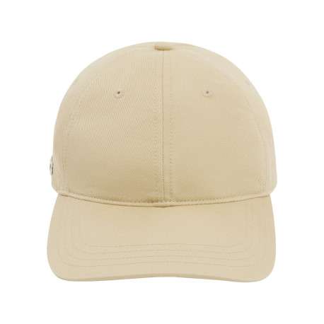 Casquette en coton beige pourvue d'une fermeture strapback à l'arrière