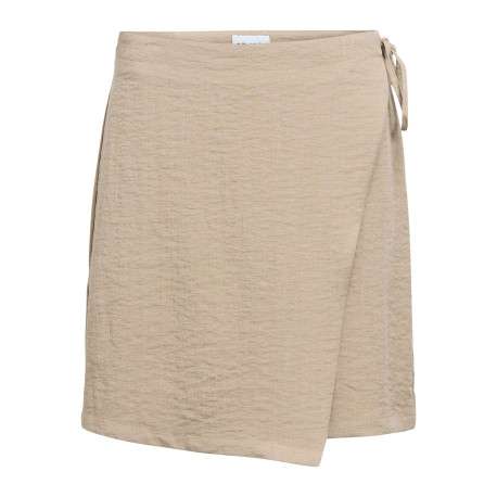 Jupe courte beige unie ajustable pourvue d'une coupe asymétrique