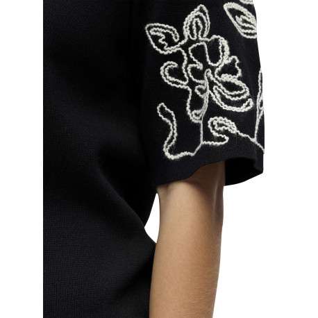 Pull noir uni pourvu d'une coupe droite et de manches courtes - Image 5