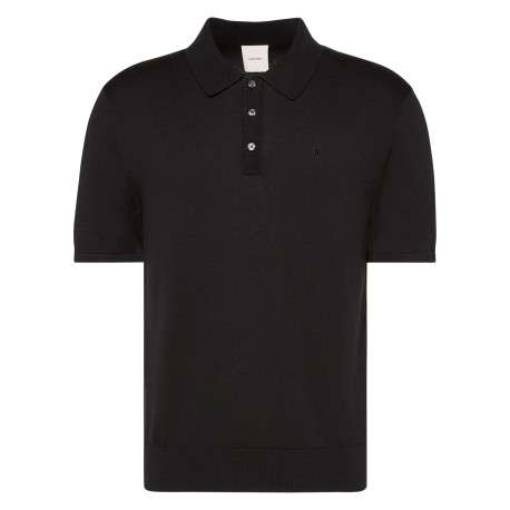 Polo en coton noir à coupe droite pourvu d'un col à revers boutonné