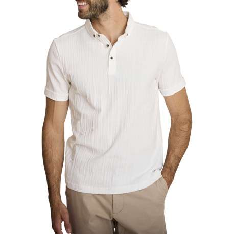 Polo en coton écru à coupe droite pourvu d'un col à revers boutonné