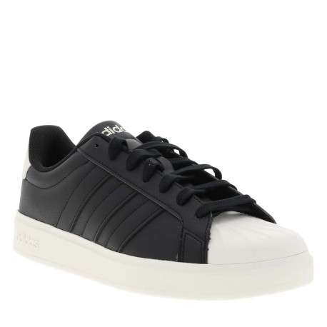 Baskets noires à talon plat avec des lacets et une semelle blanche - Image 3