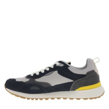 Baskets running bleu marine à talon plat avec un patch sur la languette