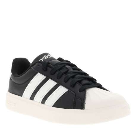 Baskets tennis noires et blanches avec un talon plat et des lacets - Image 3