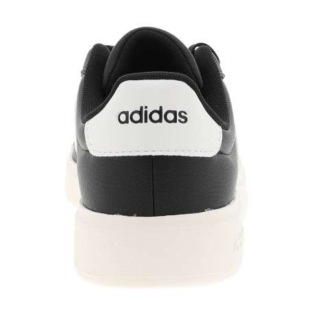 Baskets tennis noires et blanches avec un talon plat et des lacets - Image 6