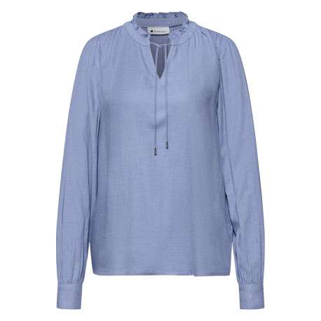 Blouse bleue unie pourvue d'un col tunisien et de manches longues