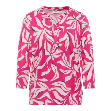 Top rose à motifs pourvu d'un col v à nouer et d'une coupe droite