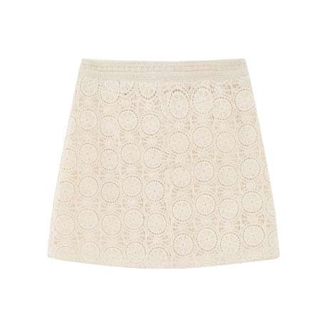 Jupe courte en coton écrue unie avec une coupe droite et un zip