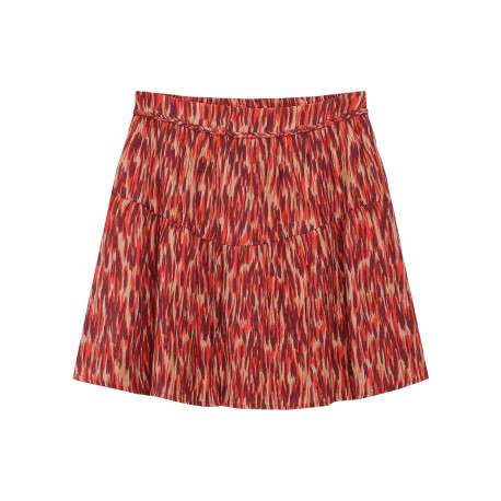 Jupe courte rouge avec motifs abstraits et une coupe fluide