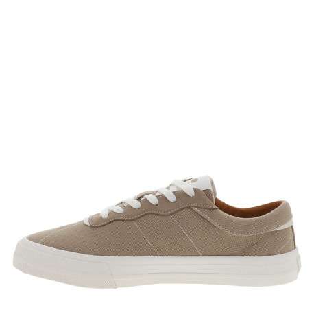 Tennis beiges avec une fermeture à lacets et des surpiqûres blanches