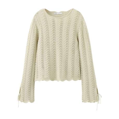 Pull en coton beige uni pourvu d'une coupe évasée et de manches longues