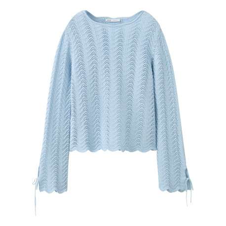 Pull en coton ciel uni pourvu d'une coupe évasée et de manches longues