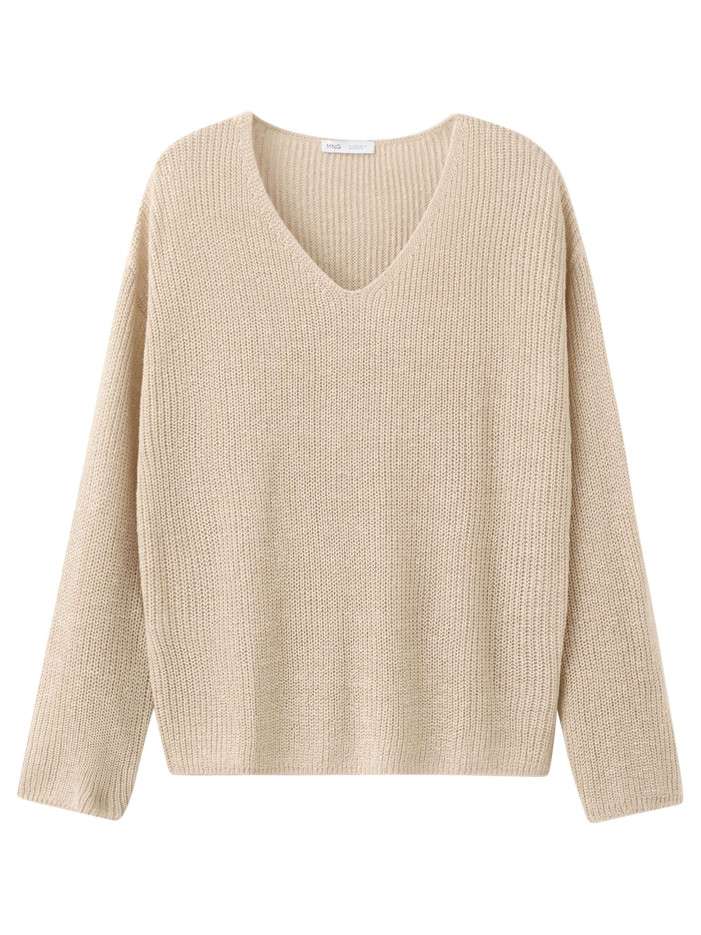 Pull beige uni pourvu d'une...