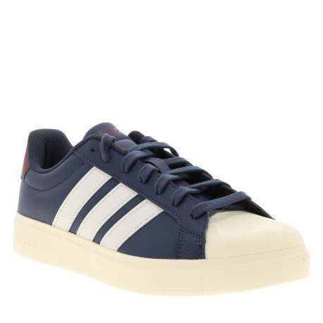 Baskets bleues avec un talon plat pourvu de lacets et de bandes blanches - Image 3