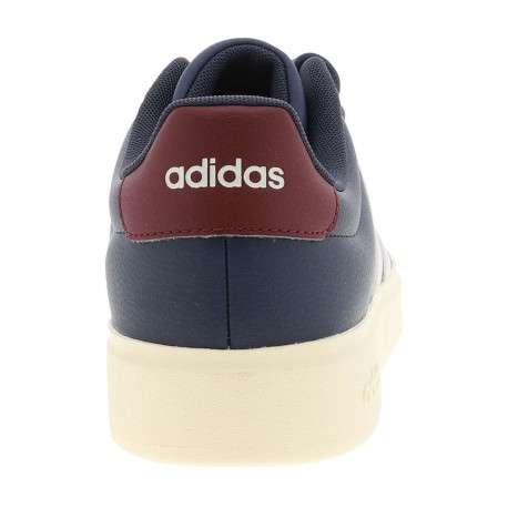 Baskets bleues avec un talon plat pourvu de lacets et de bandes blanches - Image 6