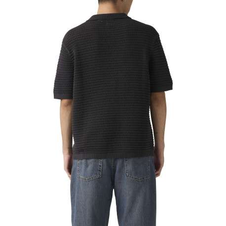 Polo en coton noir uni avec une coupe droite et un col boutonné - Image 4