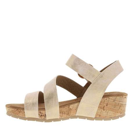 Nu-pieds or à semelle compensé et une fermeture à boucle à ardillon