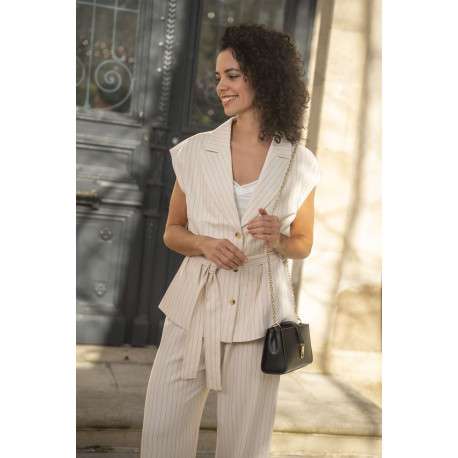 Pantalon beige coupe ample orné d'un motif à rayures verticales - Image 5