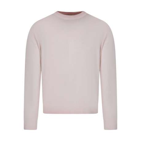 Pull en coton biologique rose uni pourvu d'un col rond et d'un aspect fumé