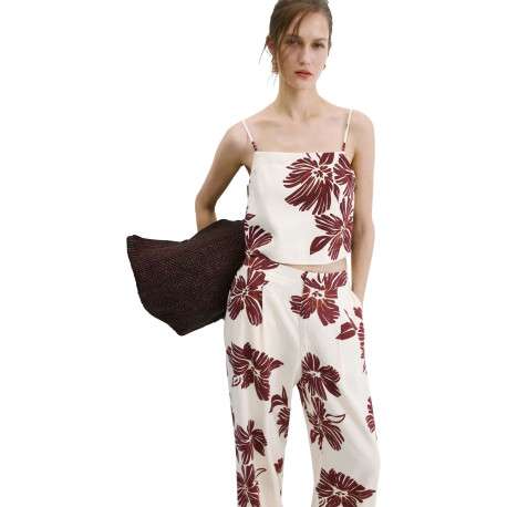 Pantalon beige à motifs pourvu d'une coupe large et de détails plissés - Image 5