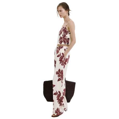 Pantalon beige à motifs pourvu d'une coupe large et de détails plissés - Image 6