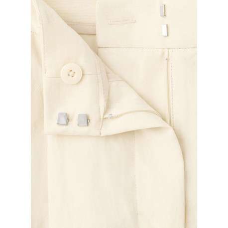 Pantalon beige uni pourvu d'une coupe droite et de passants pour la ceinture - Image 2