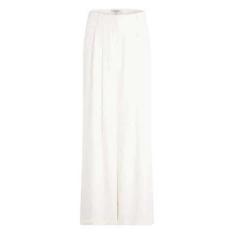 Pantalon blanc uni pourvu d'une coupe large et de détails plissés