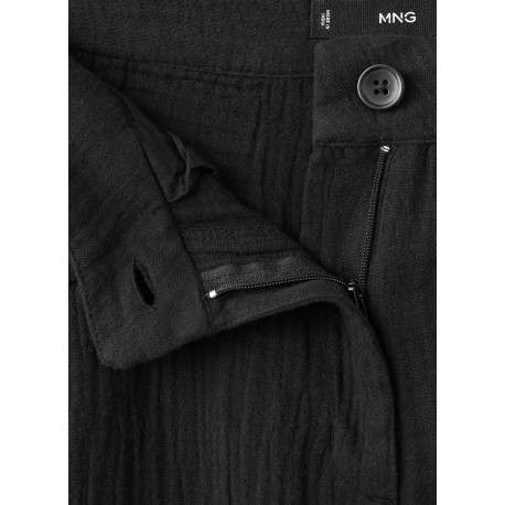 Pantalon chino en coton noir uni avec une coupe bootcut et des poches raglan - Image 2