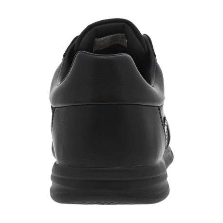 Sneakers noires à talon plat avec logos blancs et lacets plats - Image 6