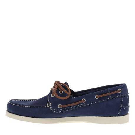 Mocassins bateau bleues en cuir avec un talon plat et à slip-on