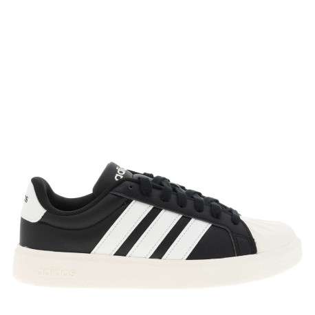 Baskets tennis noires et blanches avec un talon plat et des lacets - Image 2
