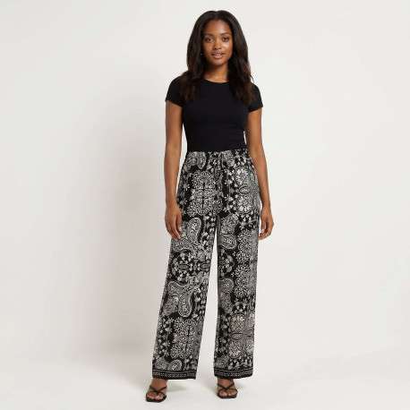 Pantalon noir à motifs pourvu d'une coupe droite et d'une taille élastiquée - Image 4