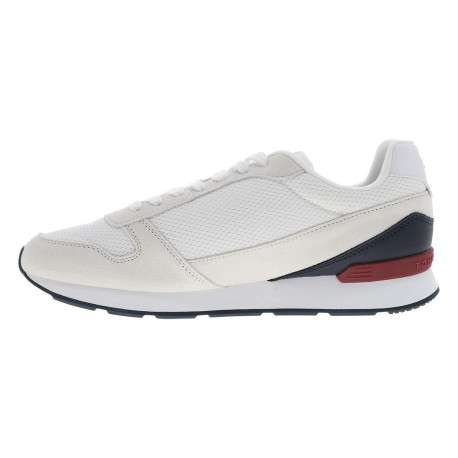 Baskets running blanches en cuir avec un talon plat et des lacets