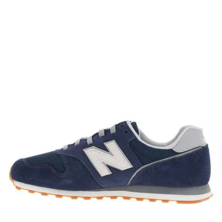 Baskets running 373 bleu marine avec un talon plat et un patch sur la languette