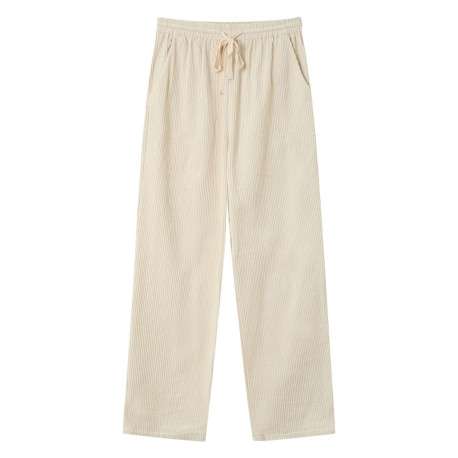 Pantalon en coton écru en velours côtelé avec une coupe droite