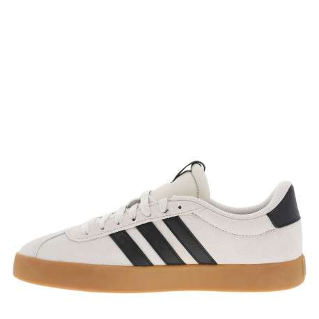 Tennis noires et beiges à talon plat avec des lacets blancs larges