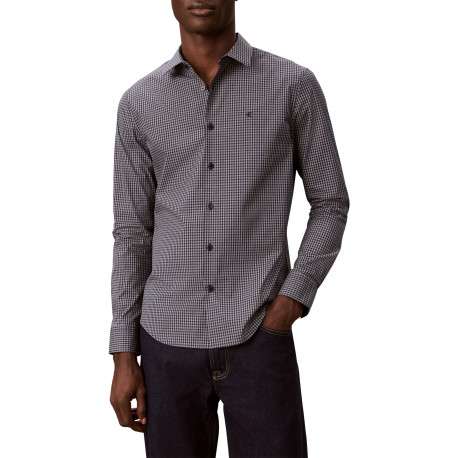 Chemise en coton bleue à carreaux avec une coupe ajustée et un col à revers - Image 2