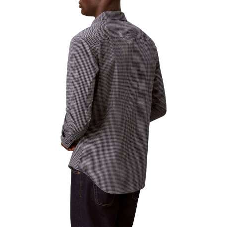 Chemise en coton bleue à carreaux avec une coupe ajustée et un col à revers - Image 3