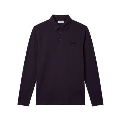 Polo en coton marine uni avec une coupe droite et un col à revers