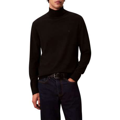 Pull en laine noir uni avec une coupe droite et un col roulé - Image 2