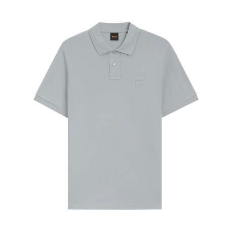 Polo en coton indigo uni avec une coupe droite et un col boutonné