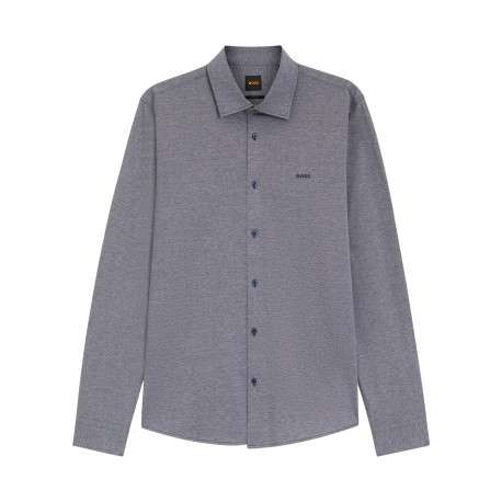 Chemise en coton indigo unie avec une coupe droite et un col à revers