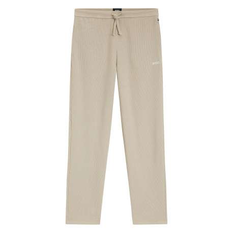 Pantalon jogging beige uni avec une coupe ajustée et une taille basse