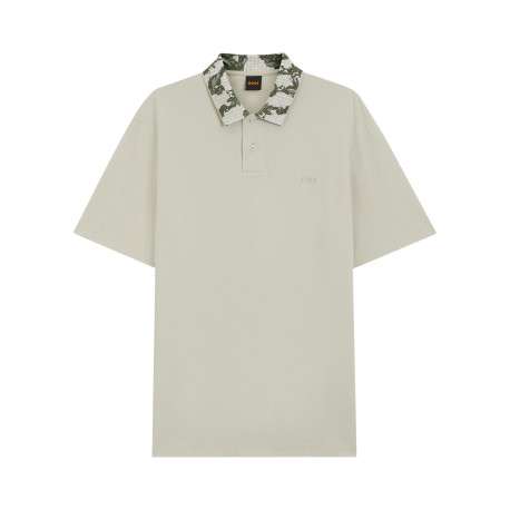 Polo en coton beige uni avec une coupe droite et un col boutonné