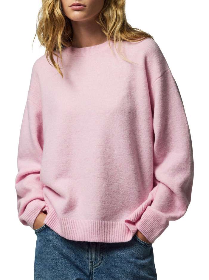 Pull rose uni avec une...